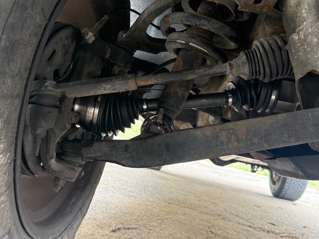 New CV axle installed in undercarriage